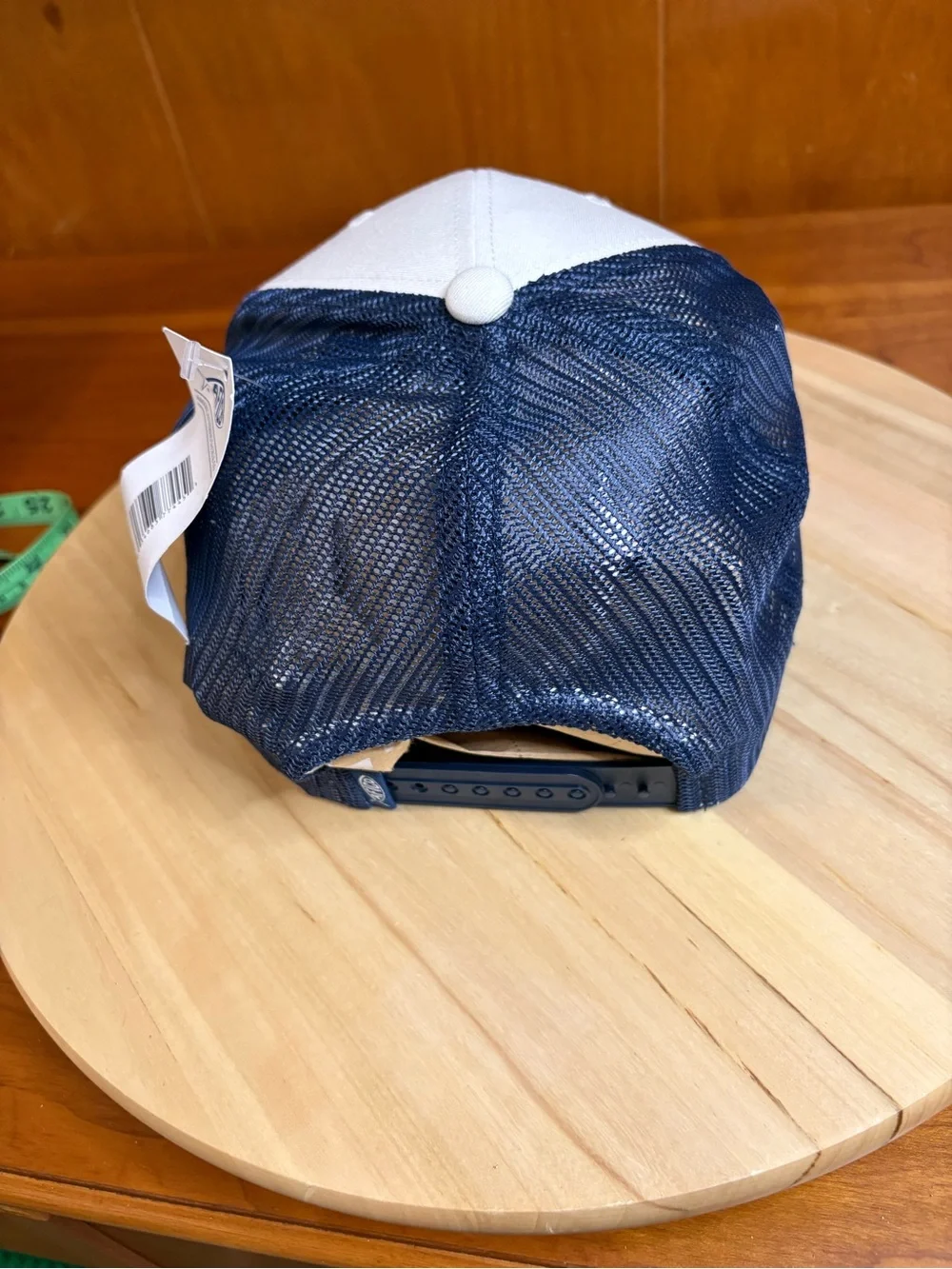AFTCO Meric trucker hat with an embroidered American flag billfish graphic. NWT